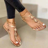 Nuevas sandalias de verano al aire libre informales de playa a la moda para mujer, zapatos planos con decoración de Metal para mujer