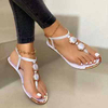 Nuevas sandalias de verano al aire libre informales de playa a la moda para mujer, zapatos planos con decoración de Metal para mujer
